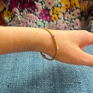 Gorgeous 18k braided Yellow and White Gold Bangle
